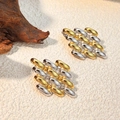 Two-tone gold and silver woven geometric stud earrings in a luxury capsule design - 3D Woven Geometric Shape