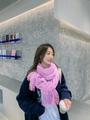 Pink cashmere-feel scarf with elegant fringe detail worn by a model in a modern style - Light Purple Heather