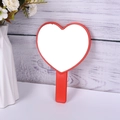Cute red heart-shaped handheld makeup mirror with minimalist handle and plastic frame - Red