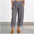 Detail view of grey cotton linen harem pants featuring elastic waist and side pockets - M / Bottoms / Gray