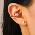 Silver ear cuff set with a vibrant pink gemstone and white zircon on female ear - Pink Main Stone Silver Zirconia Ear Bone Clip Style (G-456)