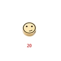 Detailed view of round gold stainless steel bead with smiley face engraving for jewelry DIY - Expression 20