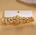 Set van 5 paar gepolijste gouden geometrische C-vormige oorringen op kaart - Set van 5 Paar - Goud Milieuvriendelijk (Stalen Pin)