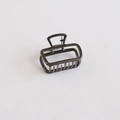Minimalist gunmetal grey rectangular hollow metal hair claw clip with a polished finish - Arc Rectangle / Gunmetal