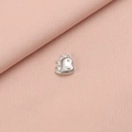Detailed close-up of a silver stainless steel dinosaur pendant on pink fabric - 1# Dinosaur Style