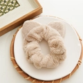 Beige plush cat ear scrunchie with soft faux fur texture for versatile hair styling - Khaki