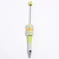 DIY beaded ballpoint pen in gradient green finish with floral accents and rhinestones - Spray Painted Yellow Gradient