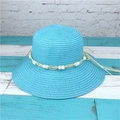 Detail of blue straw sun hat with decorative white beads on blue wooden background - M (56-58cm) / Sky Blue