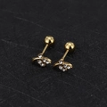 Macro shot of gold threaded stud earrings with sparkling zircon leaf detail on black texture - Leaf - Gold