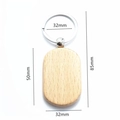 Oval beech wood keychain with silver metal ring, minimalist natural wood grain finish - Stadium Shape