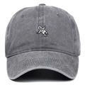 Close-up of the vintage washed dark grey cotton baseball cap with astronaut embroidery detail - Gray