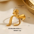 Chic golden stainless steel bow ring for women with large geometric ribbon design - Streamlined Bow Shape (1818)