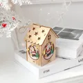 Lighted wooden Christmas cabin ornament with star cutout and Santa Claus design - Colorful House - Santa