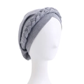 Close-up of the knitted texture and braided twist detail on the grey headscarf hat - Gray