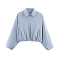 Light blue short bomber jacket with zip-up front and elastic hem on white background - Light Blue