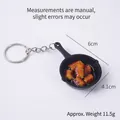 Miniature black frying pan keychain featuring realistic braised pork and green onions - Ribs Pan - Keychain