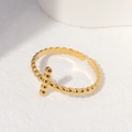 Anillo abierto de acero inoxidable dorado con un diseño de cruz de cuentas minimalista - Talla 7 (Ajustable) / Dorado