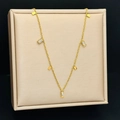 Gold necklace with rectangular crystal pendants on a luxury display tray - White Square Zirconia / Gold