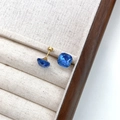 Square cushion cut blue gemstone earrings with gold finish on a beige jewelry display - Blue Cushion (10mm)