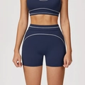 Marineblauwe yoga short met hoge taille, witte contraststiksels en bijpassende sporttop - S / Marineblauw