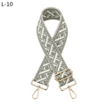 Detailed weave of sage green ethnic jacquard bag strap with gold metal hardware - Matcha Green