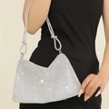 Elegant silver rhinestone knotted crescent bag shown with model in black dress - Silver