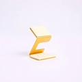 Golden metal jewelry display stand with beige fabric cushion in Z-shape design - Beige