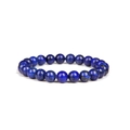 Macro view of blue lapis lazuli natural stone beads on a single strand bracelet - Lapis Lazuli