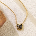 Elegant gold necklace with a butterfly pendant featuring a dark grey crystal inlay - Dark Gray Butterfly Pendant Necklace (BD020-black)