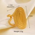 Detailed macro view of vintage gold oval embossed ring with textured surface details - Oval Ripple Embossed Style