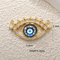 Detailed view of evil eye jewelry pendant with size specs and cubic zirconia in gold finish - A0253