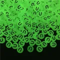 Close-up of luminous green round acrylic beads with letter U for DIY jewelry making - Letter U (100Pcs/Pack)