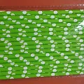 Green and white polka dot paper straws in clear packaging for football theme party - Green Polka Dot Straws
