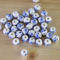 Macro shot of blue and white porcelain round beads for DIY jewelry and hair accessories - No.48-Blue and White Floral