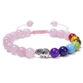Detail of hand-woven bracelet with natural rose quartz, chakra beads and silver elephant charm - Pink (Rose Quartz Elephant Bracelet)