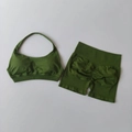 Dark green seamless ribbed yoga set featuring a halter sports bra and scrunch leggings - S / Olive Green