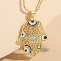 Hamsa Hand necklace with evil eye enamel charms and sparkling cubic zirconia stones - Blue