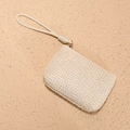 Monedero de tejido beige con asa de cuerda anudada y detalle de anillo dorado - Blanco Roto