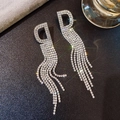 Sparkling silver D-letter tassel earrings with pavé rhinestones on black background - Letter D Full Diamond Tassel (340)