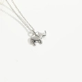 Detailed view of silver minimalist elephant pendant on a fine O-link chain necklace - Elephant / Silver
