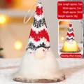 Detail of a 16cm glowing Christmas gnome plush with LED light and knit hat - Glowing Ornament 301-B