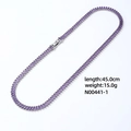 Detail view of silver zircon tennis necklace with purple square gems, 45cm length - Purple