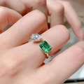 Adjustable silver ring with pear-cut clear stone and rectangular emerald green gemstone - Adjustable Open / White Gold