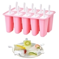 Pink 10-cavity silicone popsicle mold with sticks and fresh fruit ice pops on a white tray - Popsicle Mold 10-Grid Pink