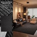 Thick black and white woven sisal-style rug with durable textured non-slip surface - Faux Sisal-Black & White Mixed-Thickened Base