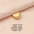 Detailed view of gold crescent bead showing 8.2x11mm dimensions on pink silk fabric - Gold