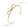 Gold bow-knot open bangle in stainless steel with 39mm dimensions and 6.3g weight - Gold
