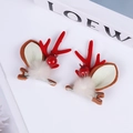 Detail of Christmas reindeer antler hair clips with red berries and white fuzzy pom poms - Red Berry Mink Fur Red
