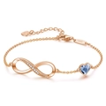Detail of rose gold S925 silver bracelet with blue heart crystal and infinity symbol - Heart Blue Crystal / Rose Gold-Blue