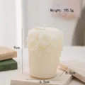 Creamy white cylindrical scented candle with detailed floral relief carvings, 9cm high - Stereo Hand Carved Flower(48) / Cream White